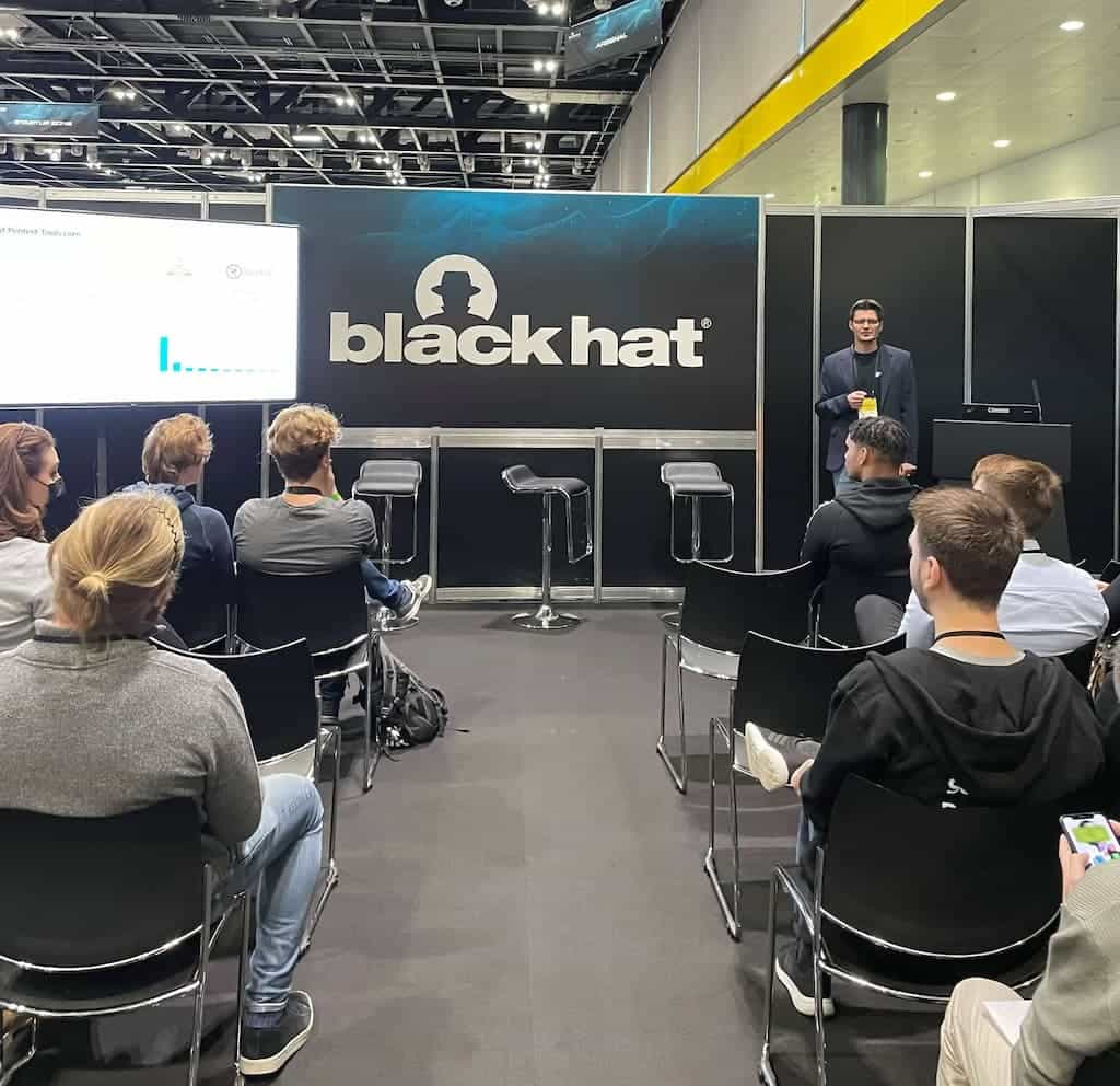 Adrian Furtună on stage at Black Hat London 2021